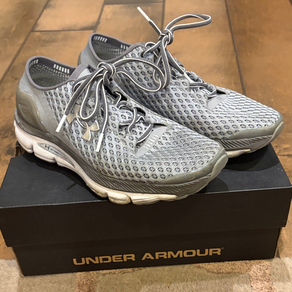 Under Armour women’s and men’s Athletic Gray Sneakers